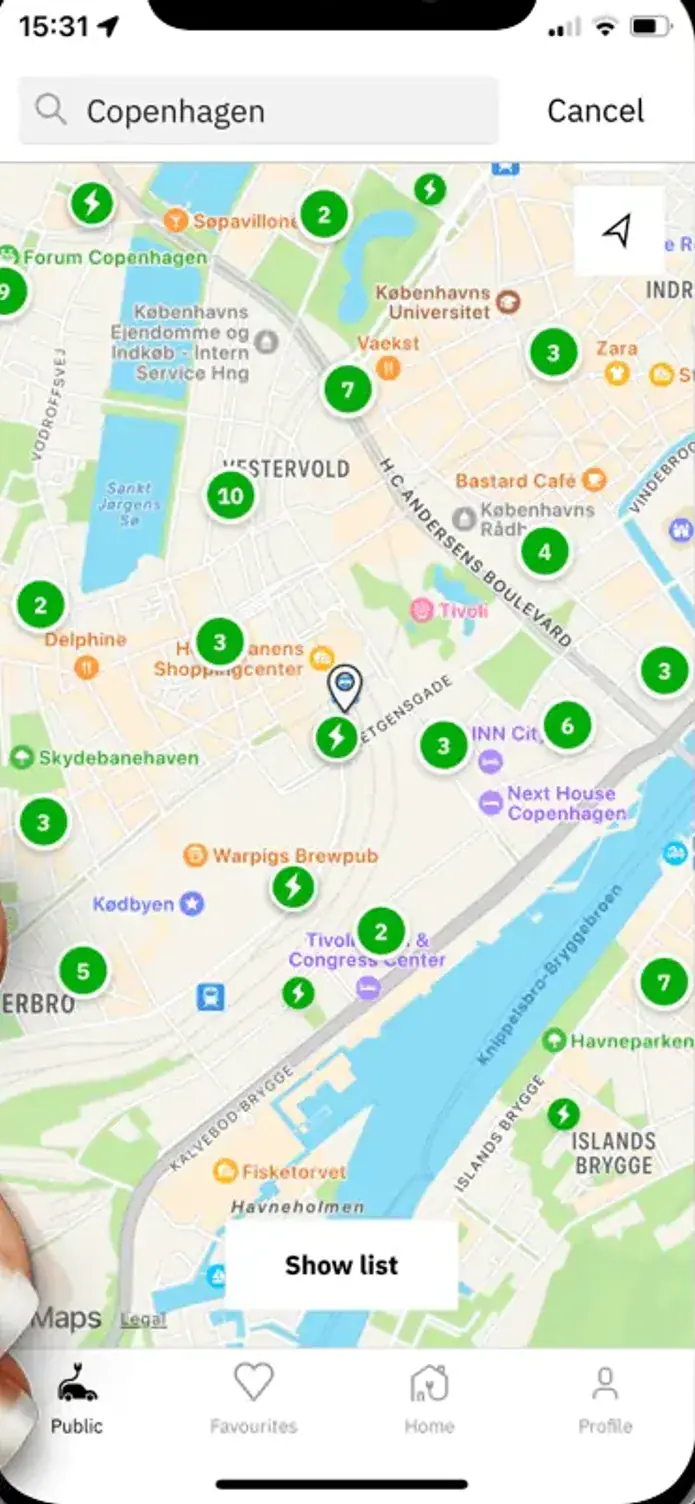 The easyCharging app showing a live map of charging points across Copenhagen, with the nearest points and their power listed below.