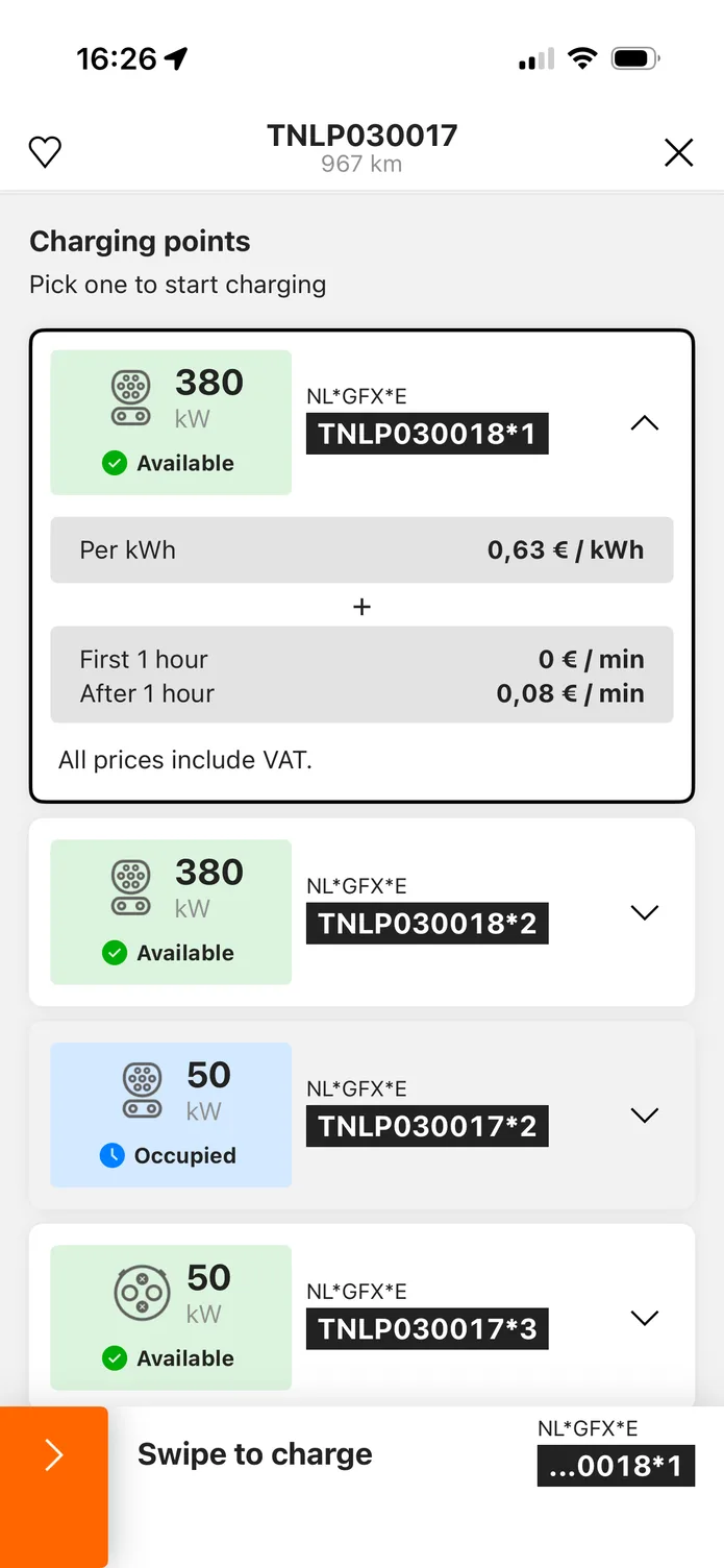 The easyCharging app showing a nearby charging station: its charging points, the price per kWh before you plug in, and a swipe control to start charging.