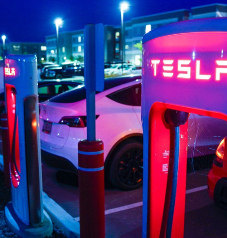 Tesla super charging stations light up at night